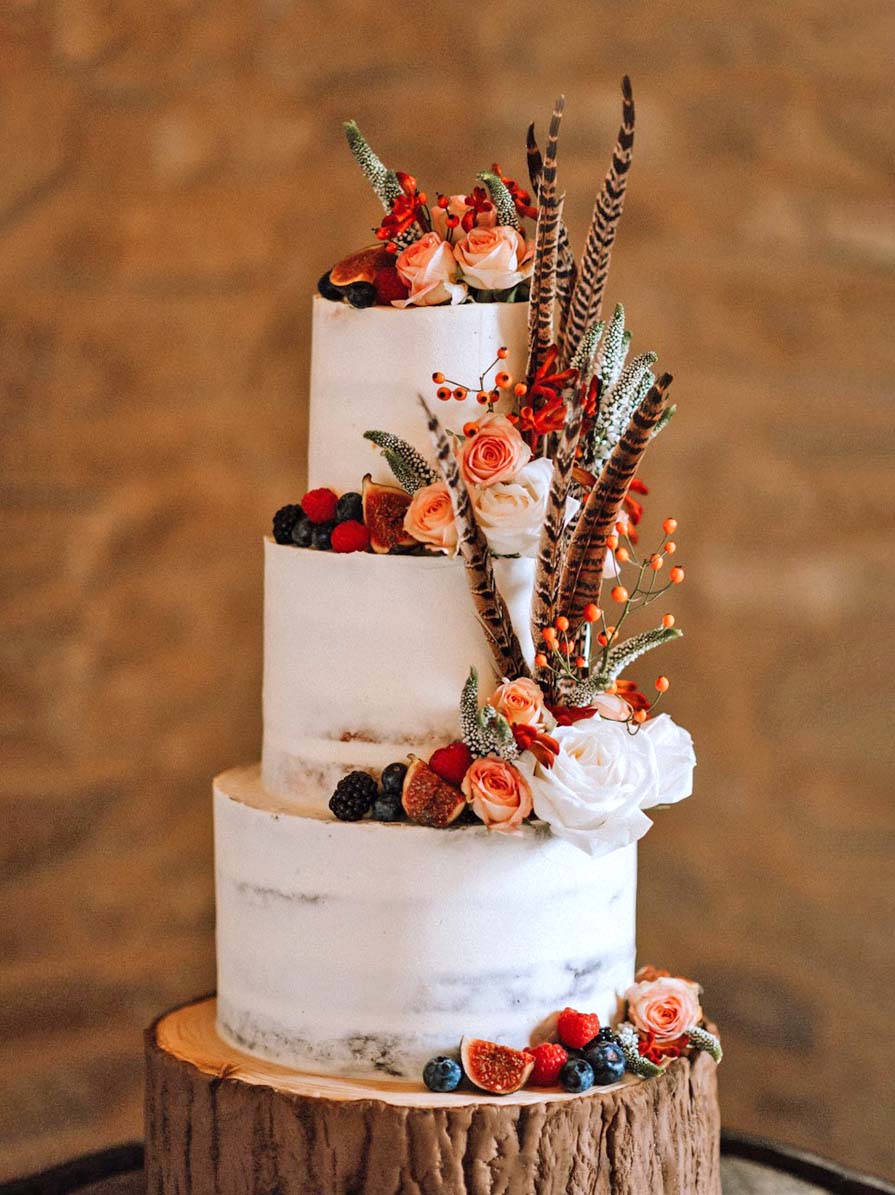Wedding Cake Decorated With Feathers